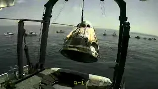 SpaceX Demo-2's Crew Dragon lifted onto recovery vessel