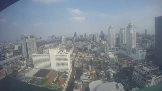 TimeLapse from Baiyoke Suite Hotel Clouds and Sun Bangkok Thailnd - WHIBT