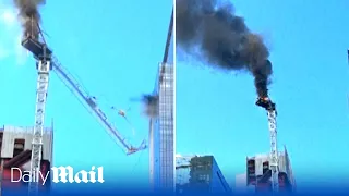 Dramatic moment crane catches fire and collapses in Downtown New York