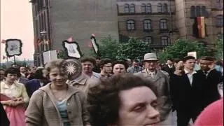 Huge crowd during May Day Parade on streets of East Berlin. HD Stock Footage