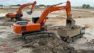 Power Extreme Digger Excavator Moving Land​ Dump Truck Operating Hitachi Zaxis 350H