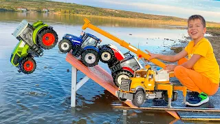 Darius rescues tractors from water with an excavator helping team Kidscoco Club