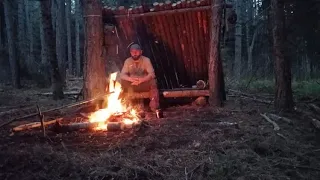 Shelter building in the woods, Cooking over the campfire pasta with  sauce, part #1