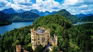 BAVARIA, GERMANY: Beautiful drone flight over the Bavarian countryside (Alps, Neuschwanstein, etc.)