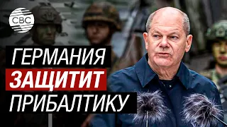 Шольц на танке. Канцлер Германии в Литве понаблюдал за учениями немецких военных