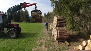 Holz Bündeln und spalten Case IH 940 mit Fortszange. Splitting wood using a loader and bale firewood