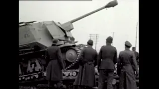 Driving captured French tanks converted into German self-propelled guns onto railway flatcars, 1943