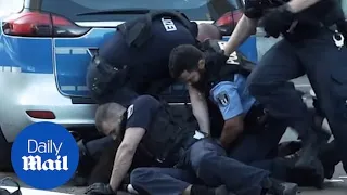 German police brutally arrest a man after he 'stole a bicycle'