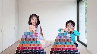 Kids try to make Pyramid by using Paper Cups