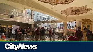Suspected suicide bombing kills dozens at Pakistan mosque