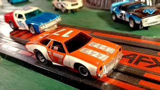 Auto World XTraction vs AFX Magna-Traction HO Slot Cars Race