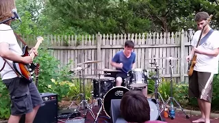 Mini Dave Grohl on drums