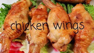 ua kooj tis qaib noj . chicken wings