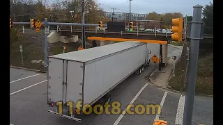 Semi truck gets fairing stuck at the 11foot8+8 bridge