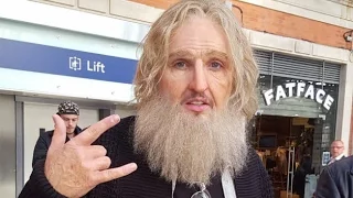 James Arthur puts on a disguise as a busker at Waterloo station