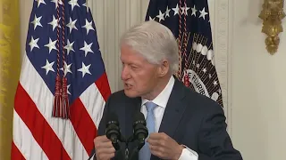 Bill Clinton back at White House to push paid family leave