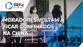 Moradores voltam a ficar confinados por causa da Covid-19 na China