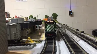 BN #7054 Leads A Stack Train Through Town (HO Scale)