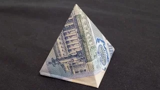a pyramid of money. origami pyramid