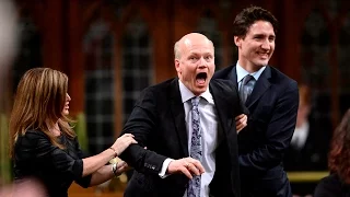 Geoff Regan being dragged by Prime Minister Trudeau to the Speaker's Chair