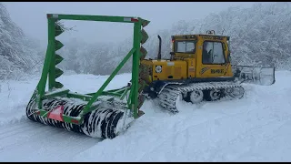 Grooming snowmobile trails