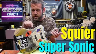 Repairing a Squier Super Sonic Sticker bombed Guitar