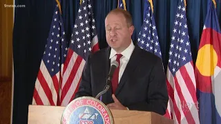 Gov. Polis comments on murder charge for parolee who left prison early because of COVID-19