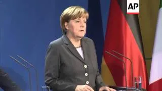 Merkel meets Italian Premier Matteo Renzi; justifies sanctions against Russia