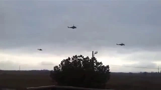 The Russians are coming! Russian military helicopters fly into Crimea