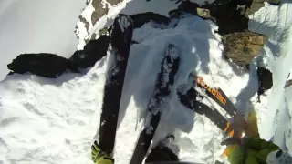 raw helmet cam footage: Skier falls off huge rocky cliff and SURVIVES