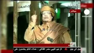 Gaddafi vows never to surrender