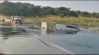 River crossing in Botswana nearly ends in Disaster for one lucky Toyota Hilux owner.