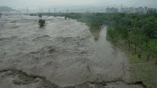 Just now, China are under water! Massive flooding turns Hainan streets into river