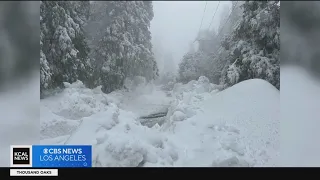 Crews plow snow out of San Bernardino mountain roads