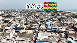 Travelling to Togo from Ghana with Motor bike + Street Food in Lome  !! Is Togo part of GHANA