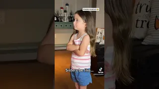 Funny Little Sister Isn’t Amused By Big Sister