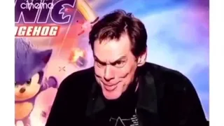 jim carrey does the grinch face