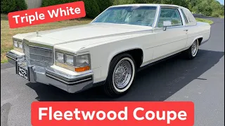 SOLD 1984 Cadillac Fleetwood Brougham Coupe FOR SALE Triple White Wire Wheels Specialty Motor Cars