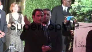 John Travolta and Kelly Preston arrive at the 2013 Vanity...