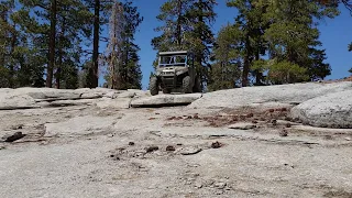 8 year old Braden driving 800 rzr. coming off a ledge bald mountain