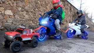 Kids Playing with Magic Toys / RC Car Towing Power Wheels Childrens Motorbike