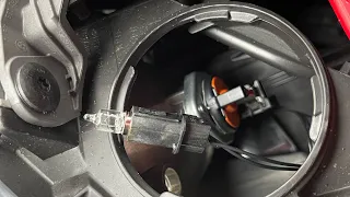 Changing headlight bulbs on a BMW 220i 2014 car