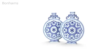 Rare and important pair of Qianlong Imperial blue and white Bajixiang Moonflasks