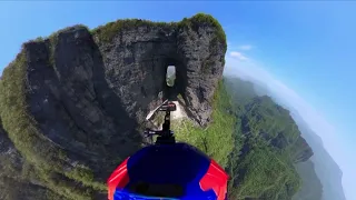 Chinese wingsuiter successfully flies through Tianmen Cave for first time