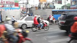 Woman Police Cop stuck in HCMC Ho Chi Minh City Traffic Vietnam