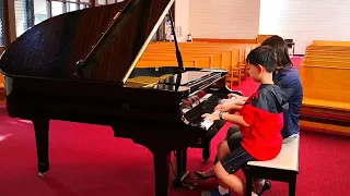 Astor Piazzolla - Libertango Piano Duet (fast version), played by Leon Lan (9) and Ms Vivian Li