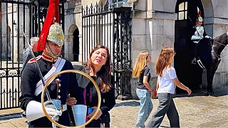 SHE PUT HER ARM AROUND THE ROYAL KINGS GAURD!