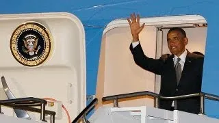 Obama arrives in South Africa at critical time for Mandela