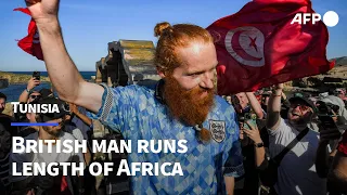 British man running length of Africa crosses finish line | AFP