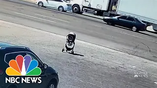 WATCH: Man races to save baby stroller rolling towards traffic